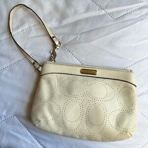 Coach Beige Wristlet with Perforated Design